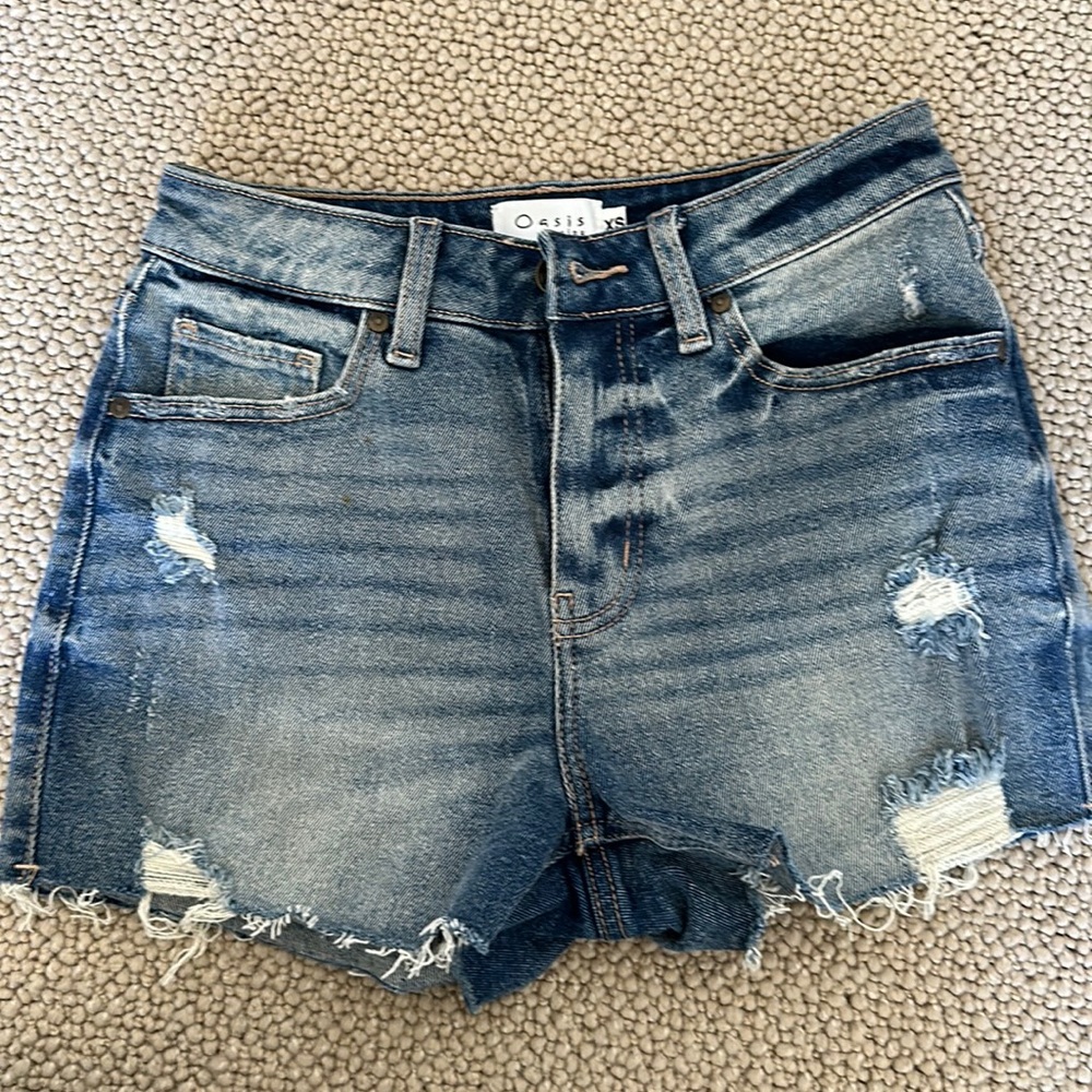 High rise denim shorts, they have stretch to them.